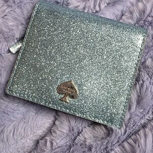 kate spade Glitter Zip Wallet in Aqua Blue with Gold Logo